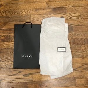 Gucci shoe shopping bag, tissue paper, and receipt note card